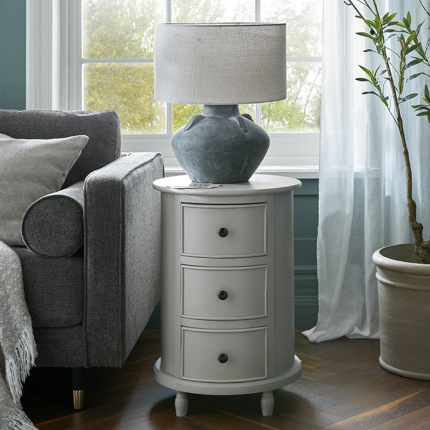 The Camden Collection 3 Drawer Round Side Table - Luxe Home Comforts